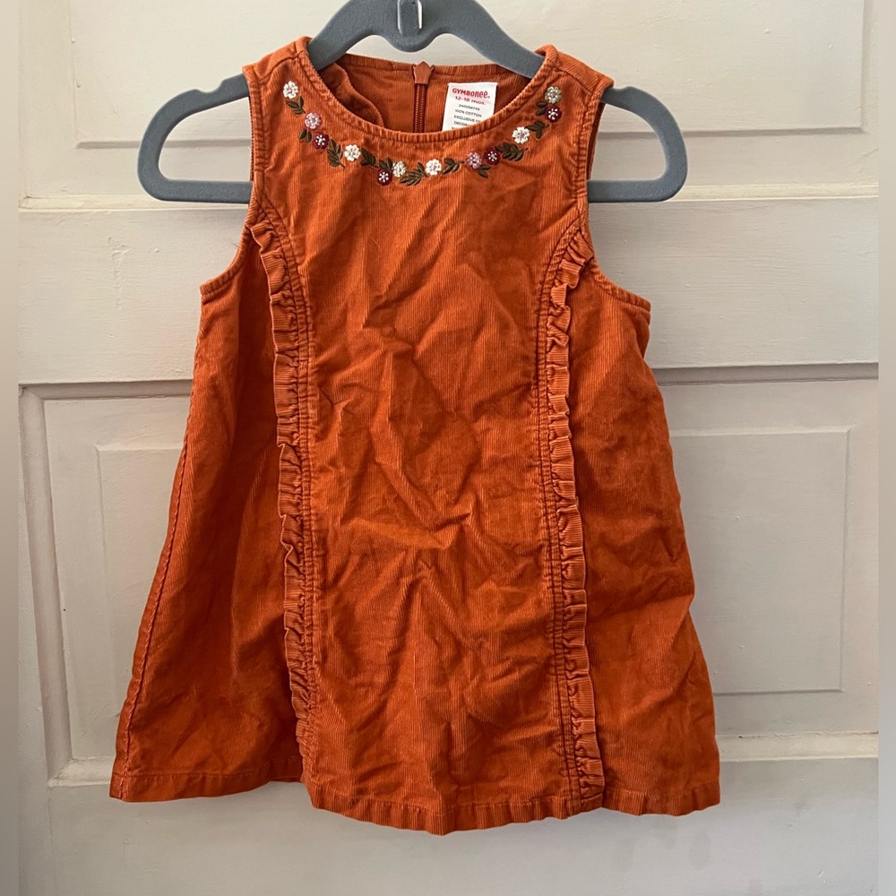 Corduroy Jumper with Ruffles and flower embroidery in Orange